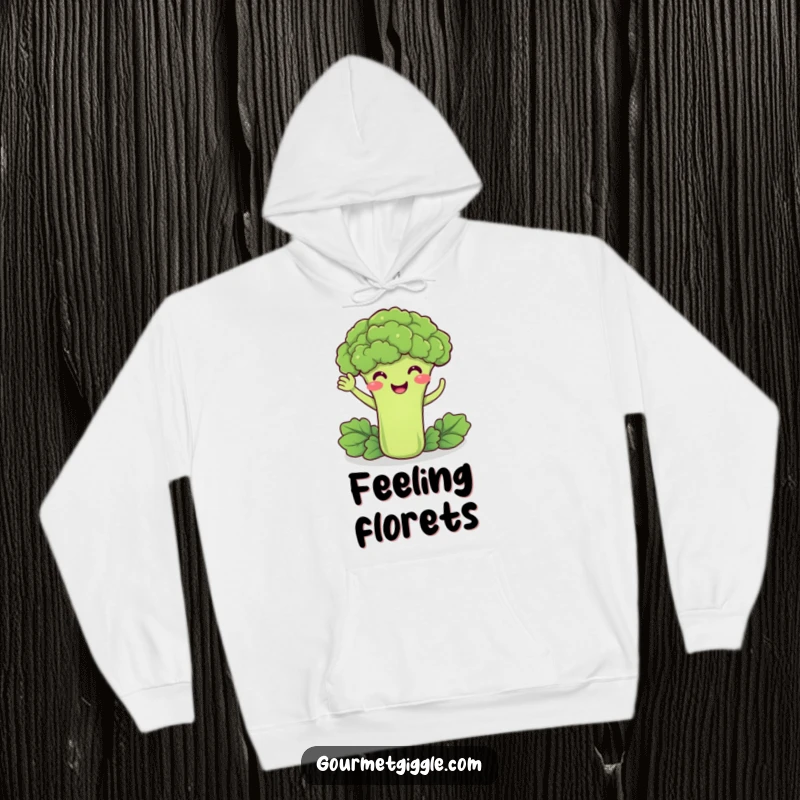 Funny hoodie featuring a delighted broccoli smiling and doing a friendly wave, offering warmth and humorous charm.