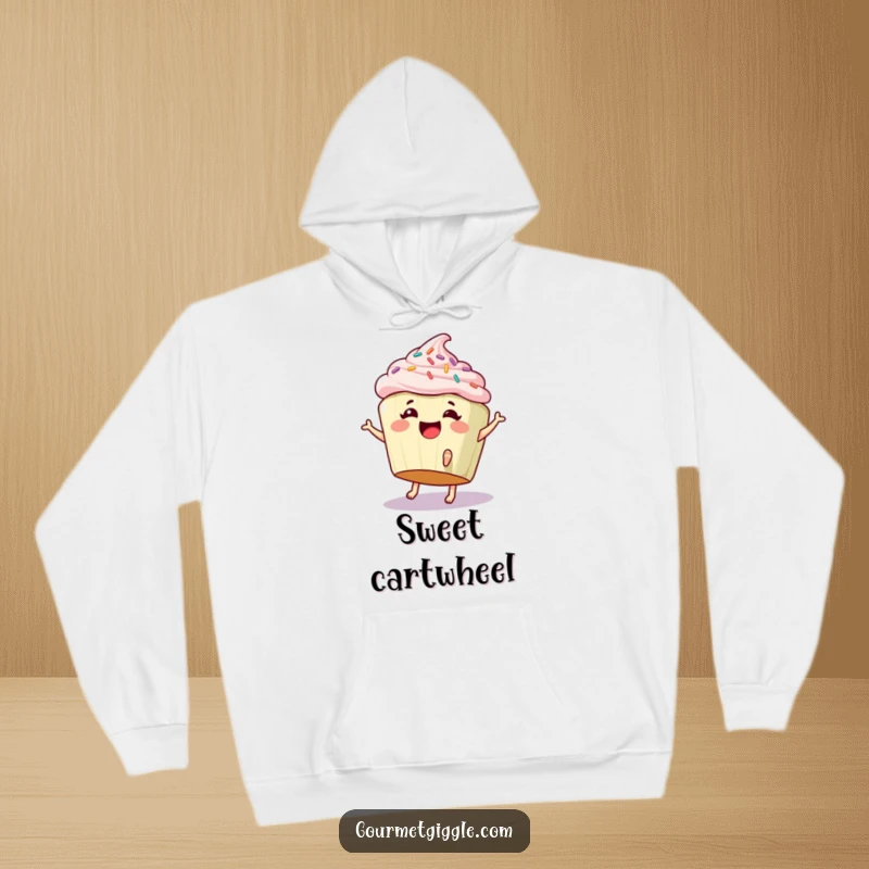 Funny hoodie showcasing a giggling cupcake with sprinkles and tiny feet cartwheeling, offering sweet comfort and humor.