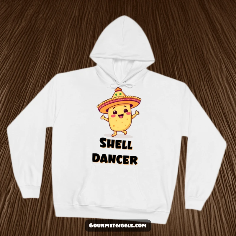 Funny hoodie featuring a beaming taco in a festive sombrero, energetically dancing a salsa step, providing cozy warmth.